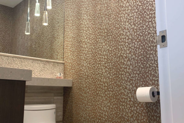 Precision Painting Plus commercial interior bathroom wallpaper installation