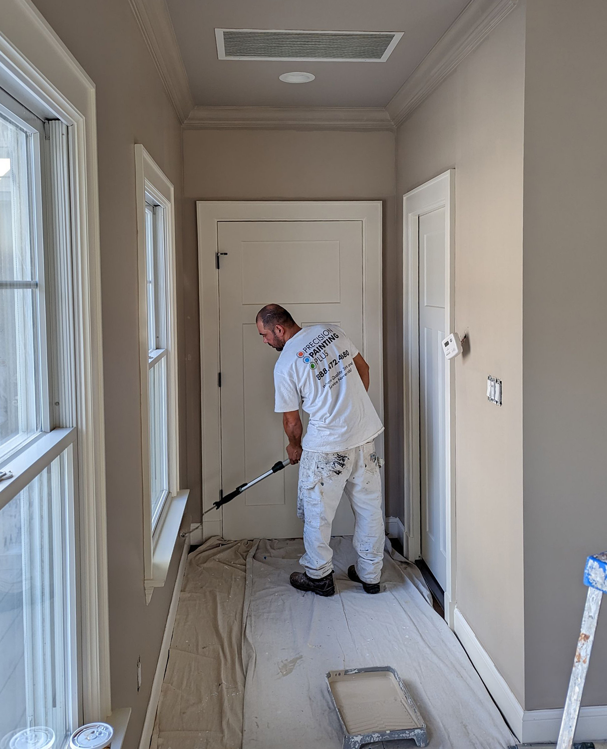 Precision Painting Plus residential house interior entryway painting team