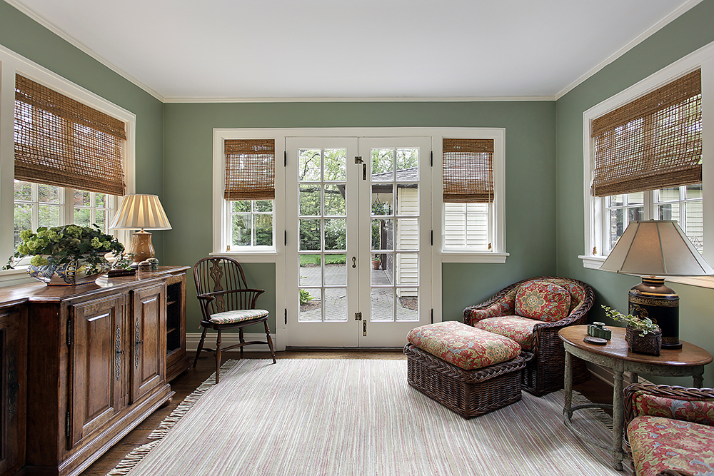 Den sunroom green painted walls interior painting white trim