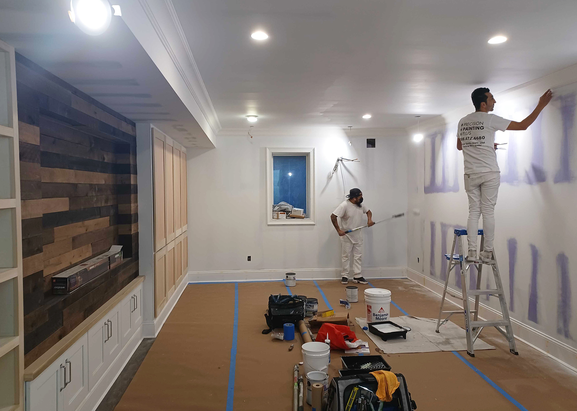 PPP painting team working on an interior painting service