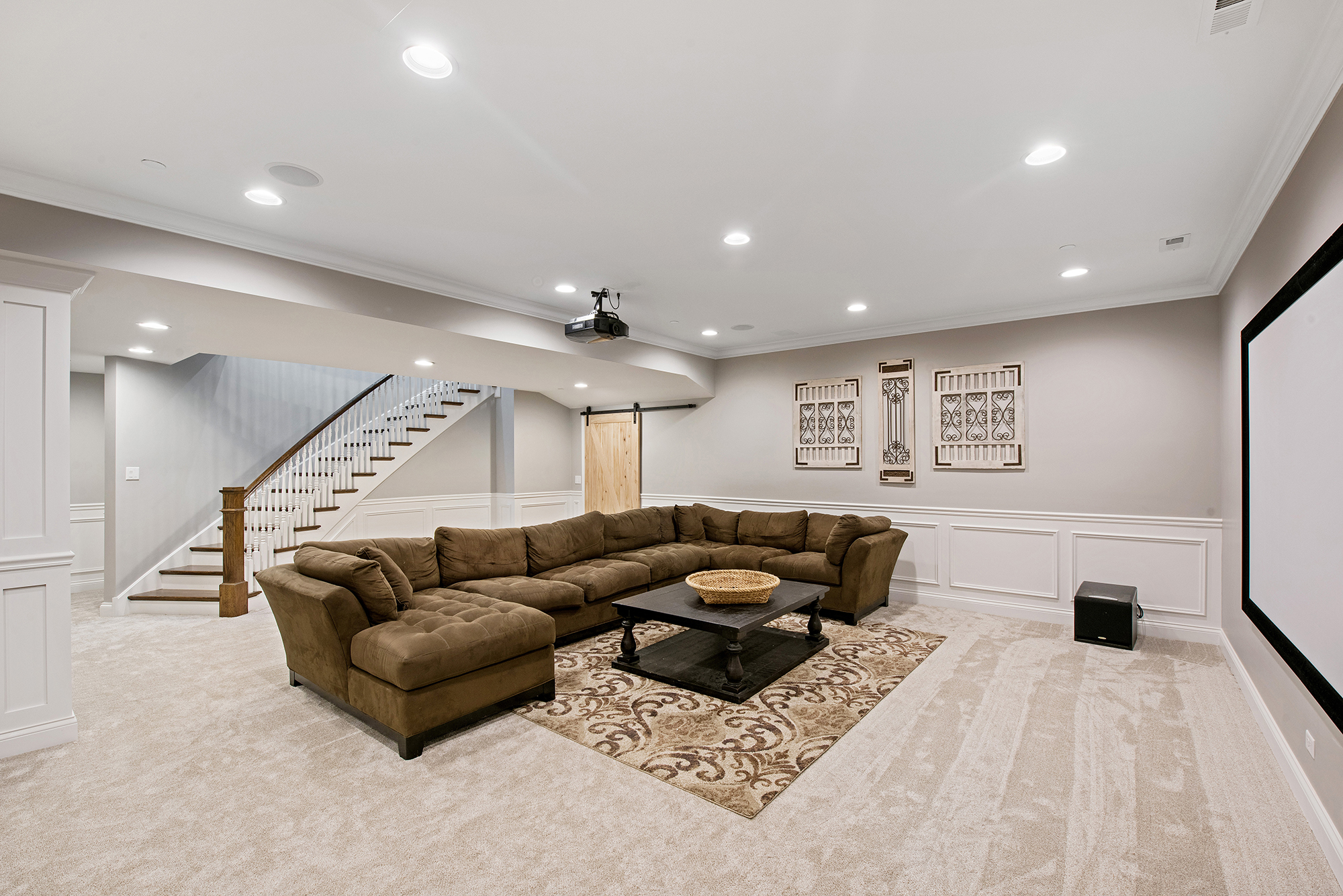 Finished painted basement painted gray walls and white trim