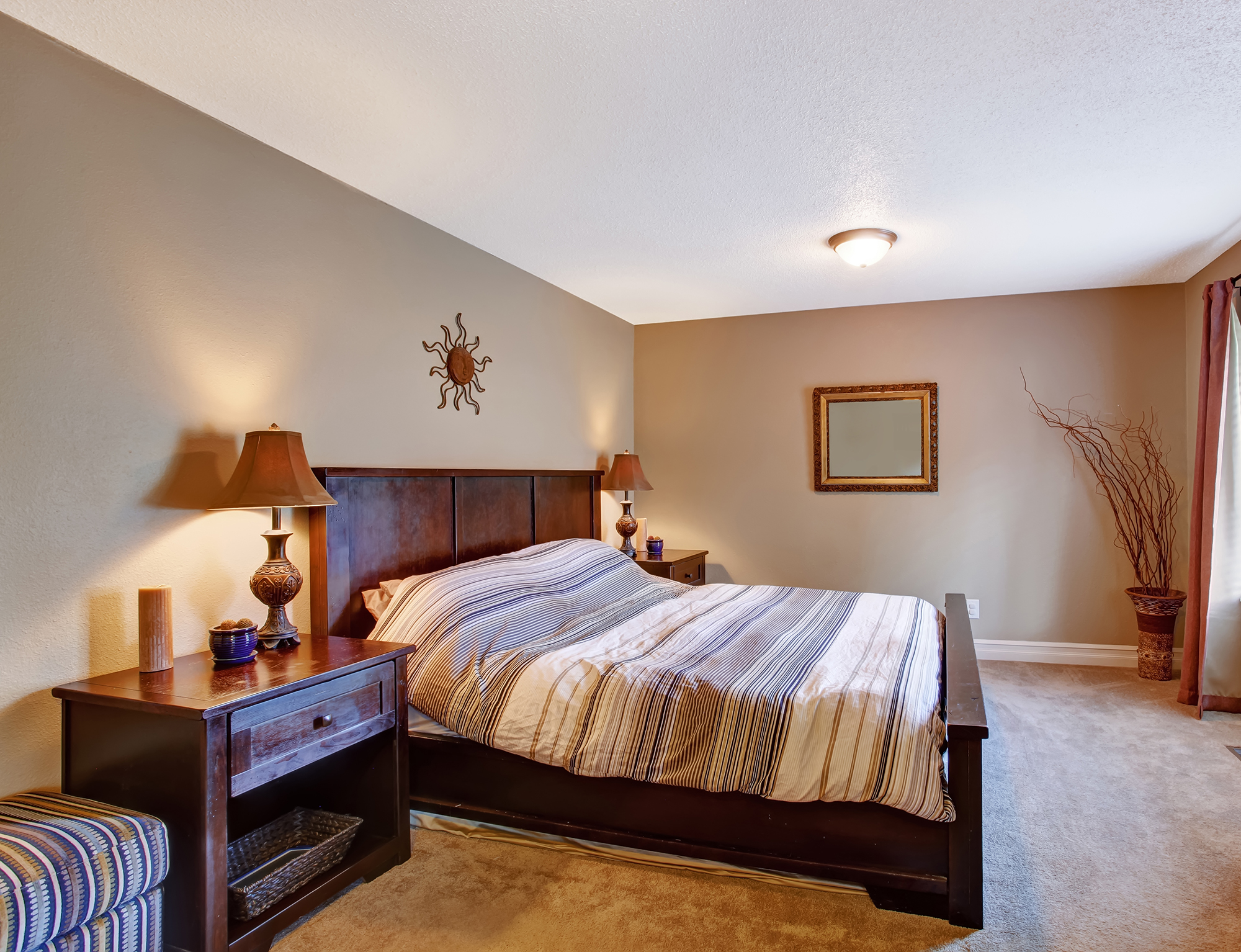 Painted brown bedroom with white ceiling