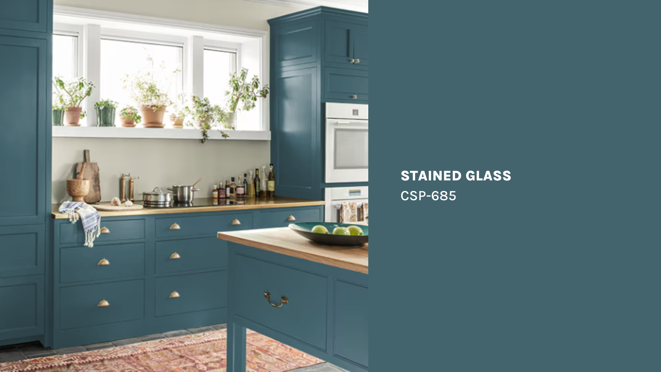 Kitchen painted in Benjamin Moore’s Stained Glass paint color