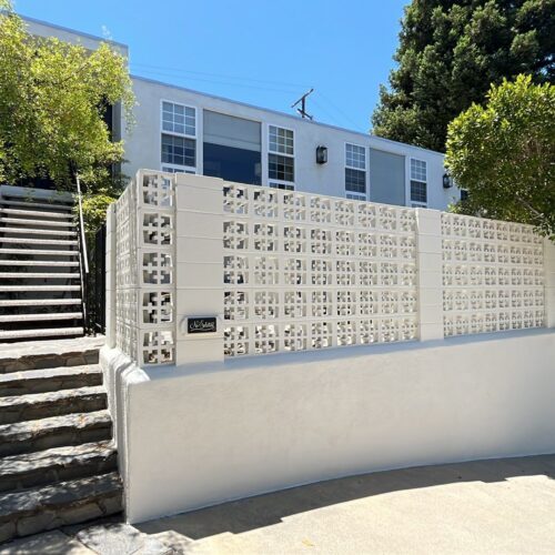 White cement fence